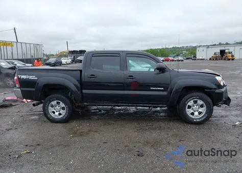2015 Toyota Tacoma Base V6 z USA, uszkodzony, nr VIN 3TMLU4EN2FM180066